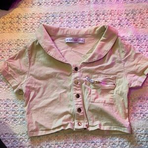 Light beige cropped collared MMMI tee